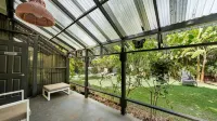 Tropical Garden Family Home & Penthouse - Sleeps 8 Walk to Beach, BBQ, Hot Tub