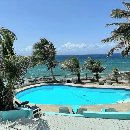 Cane Bay Area 2-bedroom gorgeous oceanfront condo @ SeaClusion  Condominiums