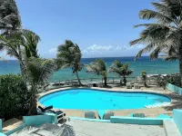 Cane Bay Area 2-bedroom gorgeous oceanfront condo @ SeaClusion  Condominiums - Swimmingpools