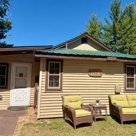 Waterfront Cabin w/ Private Dock & Outdoor Bar near Munising/Manistique