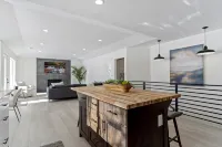 Stunning Lakefront Retreat with Jacuzzi and Unobstructed Mountain Views - 4-Star