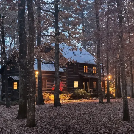 Prospect Mountain Cabin custom log home sportsman's paradise with fishing lake.