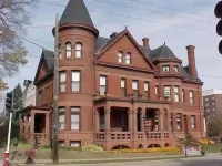 The Redstone Inn and Suites Hotels near Voices Art Symposium Historic Millwork District