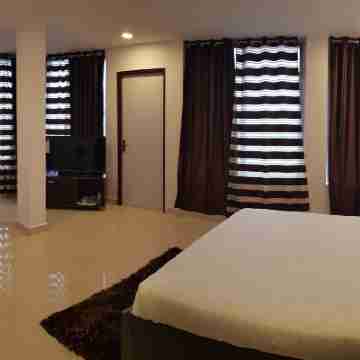 The Karma Plaza Rooms