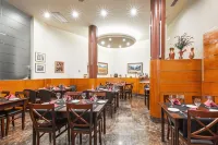 瑟拉斯柯絲莫斯公寓飯店 - 早餐