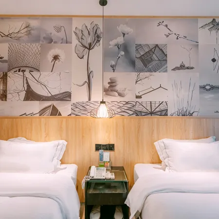 Qingmu Chain Hotel (Ma'an Shandong Railway Station Hongxing Meikailong RT-Mart)