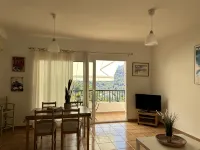 Accommodation on harbor and beach with mountain views