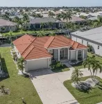 LOCATION!! Modern waterfront home;1-block to FishermanVillage; HEATED SALT POOL