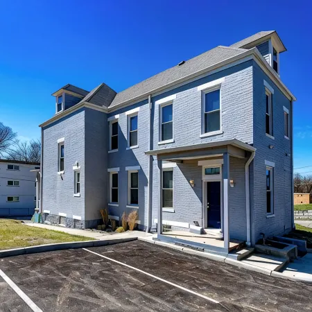 Musketeer Manor ~ 5 bedrooms & 4.5 baths off street parking & central location!!