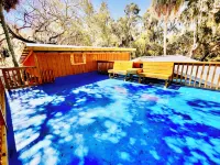 Waterfront Retreat with fenced yard, porch + bar, canal views, NEW DOCK - 3-Star