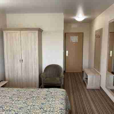 Zemlyanichniye Holmy Hotel Rooms