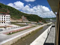 Luqulangmusi Zhongyuan Holiday Hotel - Balkon