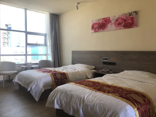 Wuchuan Yitingzicheng Business Hotel - parking