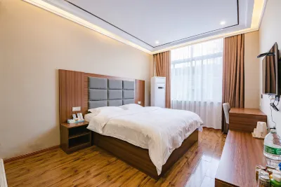 Xinyang Boao Business Hotel Hotels near Minggang East  Railway Station