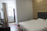 Xinpeng Hotel Hotel a Baiyü