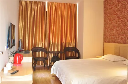 Xinbo Business Hotel Отели рядом со станцией Junanbei Railway Station