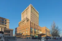 โรงแรมฮัวเฉินหลวเยว โรงแรมใกล้ศูนย์กีฬาประชาชนฮอกฮู