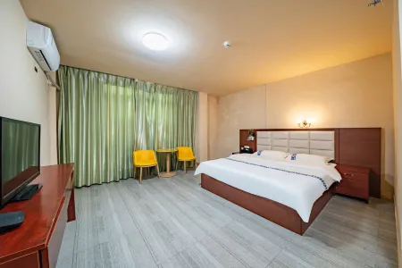 QUANNAN Junjia Business Hotel Отели рядом с достопримечательностью «Quannanxian Library»