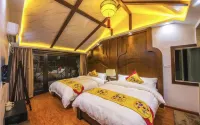 Phoenix Jiuqi Yayuan Inn (Gucheng Hongqiao Branch) Hotels in Fenghuang