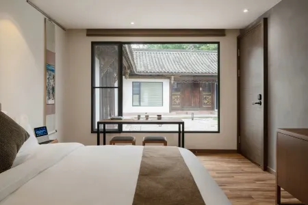 Liwu  Homestay (Longfeng Ancient Town Shop) Отели рядом с достопримечательностью «Sichuan Suining Normal School»