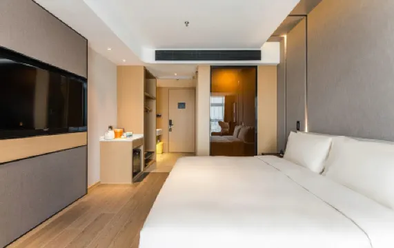 Orange Peninsula Hotel (Zhangzhou Zhongxu Square) Отели в г. Пичжоу