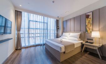 Feiman Hotel (Qingdao Chengyang The Mixc Mall) - Housity