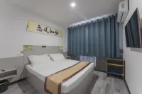 Huanhuan Hotel (Xiayuan Commercial City) - Losmen
