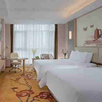維也納國際酒店（瀘州高鐵站西南商貿城店） Rooms
