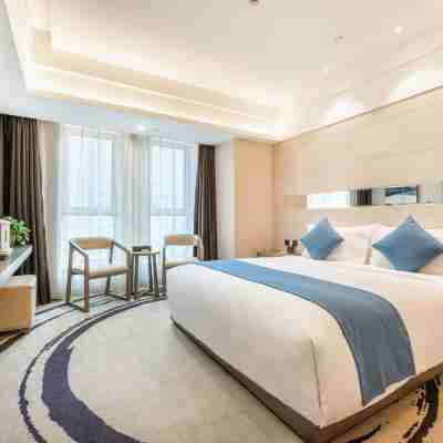 Hualong International Holiday Hotel Rooms