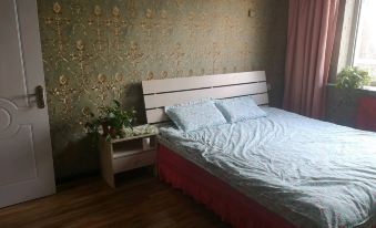 Tiantiansheng Warm Theme Apartment