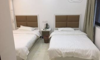Xinzheng Yibai Hotel