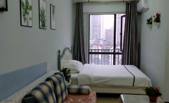 Mancheng Apartment Hotel