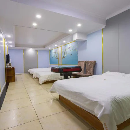 Baidu Boutique Hotel (Daqing Chengfeng Xinmart Branch) Hoteles en Daqing