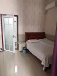Pingyi Liangshi Supermarket Hotel - Losmen