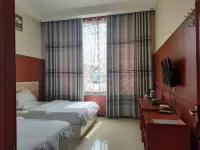 Ruxin Business Hotel (Chengwu Shengshi International Building Materials City)