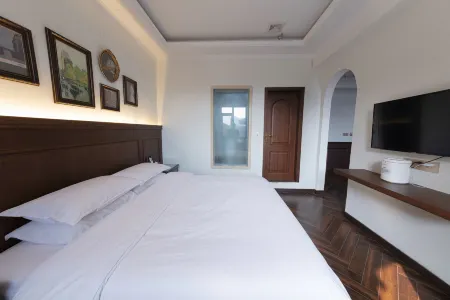 Guangming Garden Hotel Huixian Отели в г. Хуэйсянь