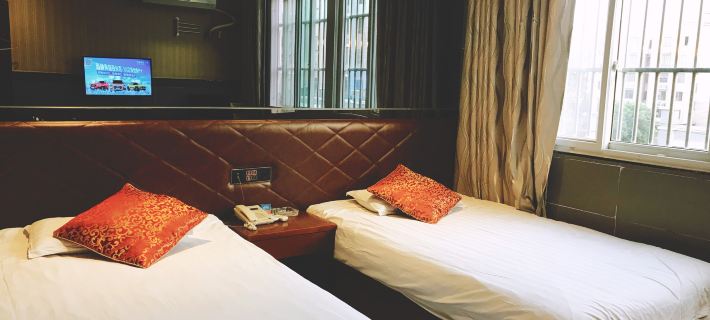 Hexianxiangqing Business Hotel Hotels in He County