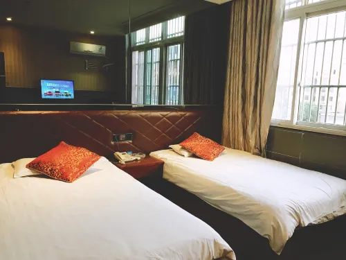 Hexianxiangqing Business Hotel