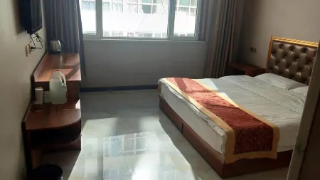 Yonghe Yixin Hotel Отели в г. Юнхэ