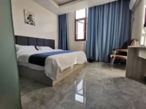Jianshi Yueke Home Hotel - Inns