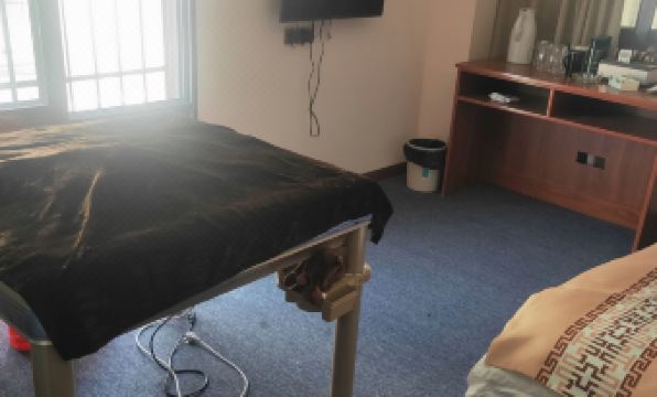 Yingshan Xinlong Yiyun Business Hotel