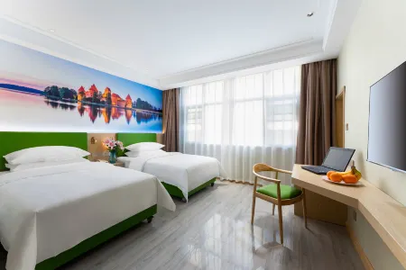 Vienna 3 Best Hotel (Tongxu Xingfu Road) Отели в г. Тунсюй
