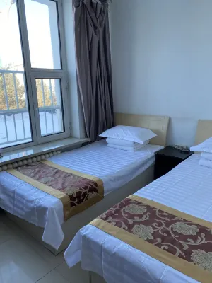 Ewenki Qi Xinyuan Hotel - 2성급