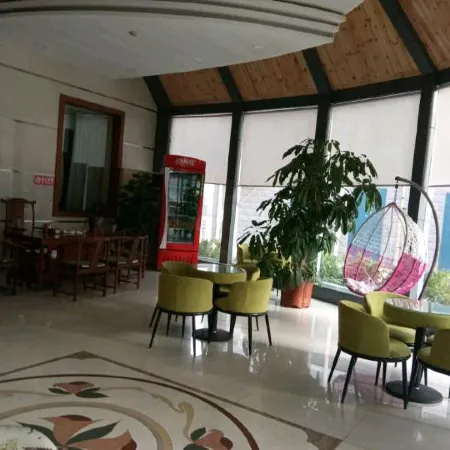 Huayi Hotel (Gaoqing Aizunke)
