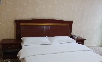 Beichuan Yueyi Xinjie Business Hotel