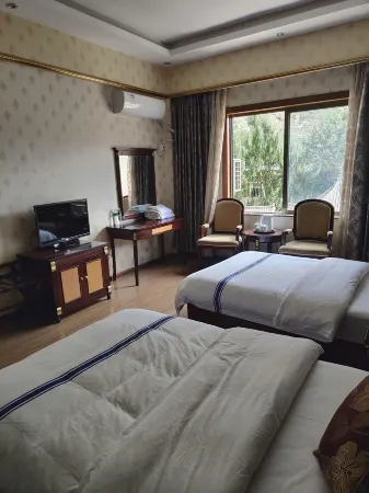 Qufu Carridge Hotel Отели рядом с достопримечательностью «Xizang Yanjing Millennium Ancient Salt Field»