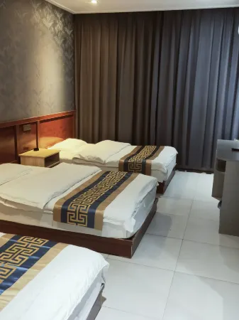 Xingyang Yanhe Business Club Отели рядом с достопримечательностью «Huancuiyu Scenic Area»