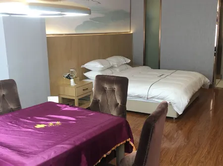 Quxian Huilong Hotel Отели рядом со станцией Qu County Railway Station