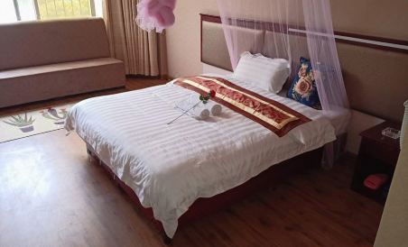 Pingjiang Jiutian Hotel - Housity