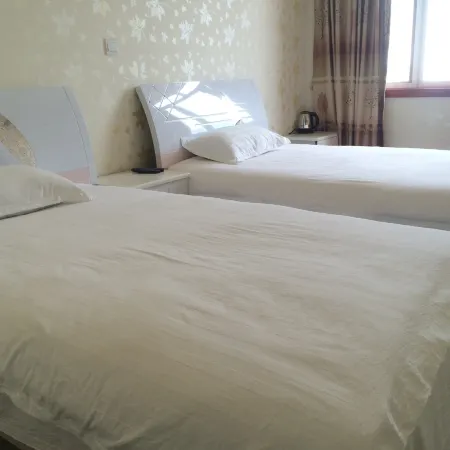 Beichuan Yueyi Xinjie Business Hotel
